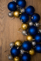 christmas balls on wooden background