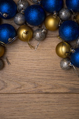 christmas balls on wooden background