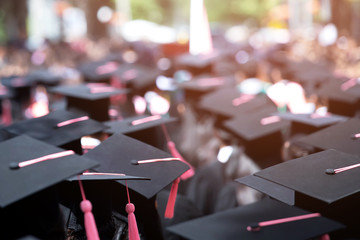 Group of Graduates during commencement. Concept education congratulation in University Degree....