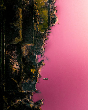 Aerial above a pink lake in Spain