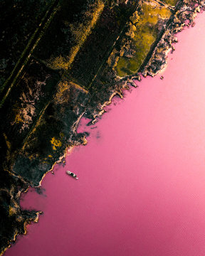 Aerial above a pink lake in Spain