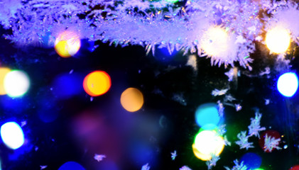 Abstract bright background. Multi-colored bokeh on a blurred background. Holiday mood. Out of focus.