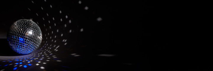 Glittering mirror disco ball. Nightclub. For advertising or web design. Entertainment, disco or music show extra wide panorama banner background