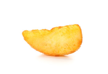 Slice of baked potato wedges isolated on white background, closeup