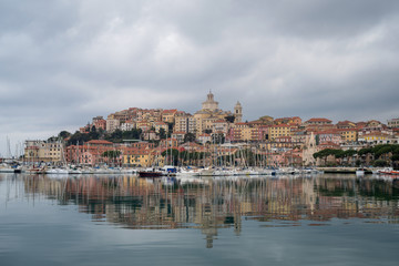 Fototapeta na wymiar Imperia. Liguria. Panoramic view from the sea of ancient city