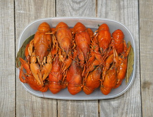 Red boiled crayfish on a wooden ancient backgroundOLYMPUS DIGITAL CAMERA
