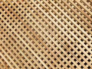 Close up of lattice wooden fence panels