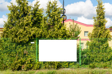 Blank white banner for advertisement on the fence