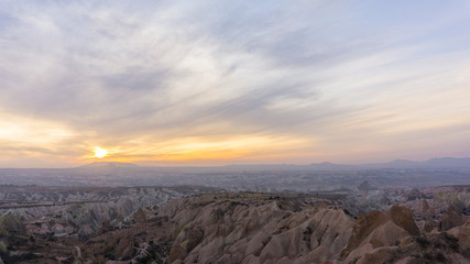 view of a rocky valley during sunset 