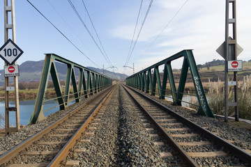 Fototapeta na wymiar Parallel railways over a bridge