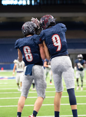 Great action photos of football players making amazing plays during a football game