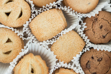 Paper wrapped butter cookies in a can from above