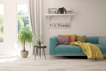 Stylish room in white color with sofa and summer landscape in window. Scandinavian interior design. 3D illustration