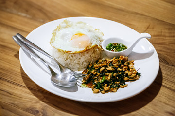 " Kao Pad Kra Prao " stir-fried with minced pork and fried egg , Thai spice food