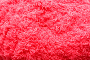 Wool yarn close-up colorful pink thread for needlework in macro