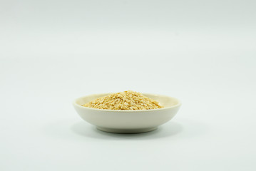 Fresh barley malts isolated on a white background.