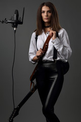 Portrait of a beautiful, slender girl musician