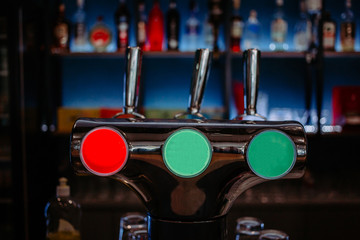 Draft beer dispenser in the night club. Draft beer system