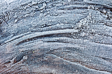 wooden background covered with hoarfrost