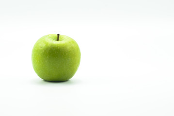 Fresh green apples on a white background isolated.