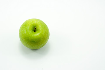 Fresh green apples on a white background isolated.