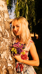 Portrait of beautiful girl in field