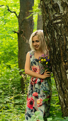 Portrait of beautiful girl in field