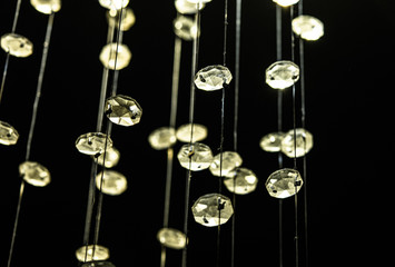 crystal light balls hanging on strings