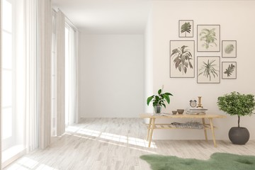 Empty room in white color with table, home plant and pictures on a wall. Scandinavian interior design. 3D illustration