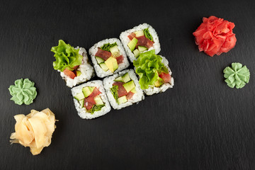 sushi and rolls on slate