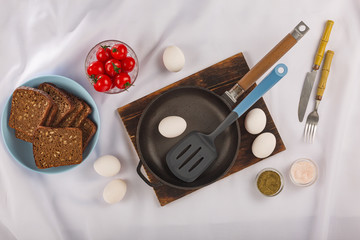 Healthy food ingredients. Fresh chicken eggs on the kitchen table.