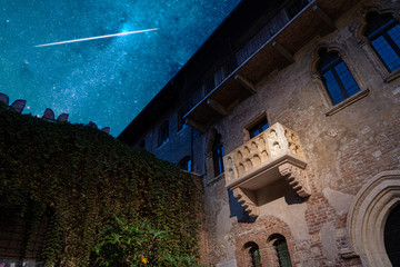 The original balcony of Romeo and Juliet under a stunning starry sky. Verona, Italy. Tragedy by...