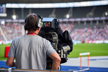 Cameraman at sports event