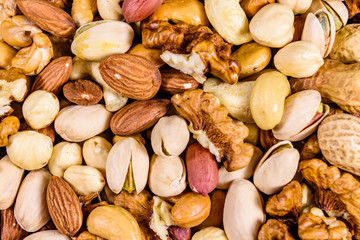Background of the various nuts (almond, cashew, hazelnut, pistachio, walnut). Vegetarian meal. Healthy eating concept