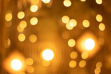 Bokeh blur of lights for decorating Christmas trees at Christmas and New Year's every year. As a light background