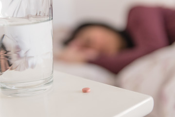 pills on a table in bedroom