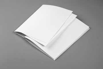 Blank portrait mock-up paper. brochure magazine isolated on gray, changeable background / white paper isolated on gray