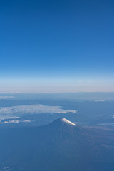 A birds eye view close-up the Mount Fuji ( Mt. Fuji ) and blue sky. Scenery landscapes of the...