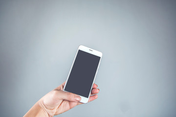 woman hand holding smart phone