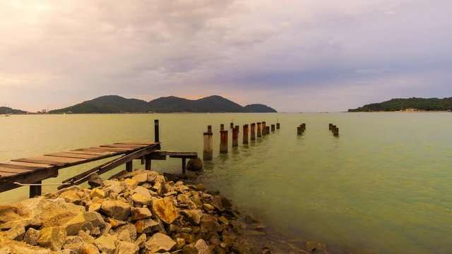 Time Lapse Of Abandon Jetty Of Marina Island,Lumut Malaysia With Dramatic Cloud During Sunset.4K