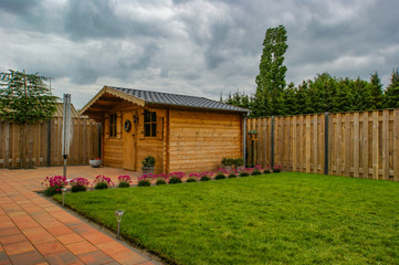 Fototapeta na wymiar wooden garden shed in the backyard