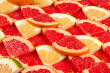 Pomelo and grapefruit slices background.