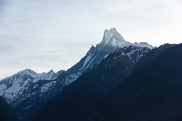 A beautiful view of sunlight streaking across the summit of Machapuchare aka the Fishtail mountain...