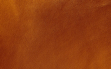 Leather. texture of genuine leather is brown. The structure of the skin material close-up. 
