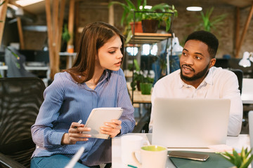 Sharing ideas. Two desingers working on project together