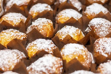 Freshly baked muffins in the store selecrive focus
