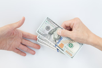USA Banknote in human hand And forward it to the other hand