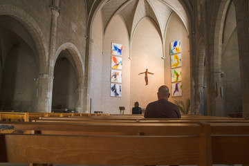 people praying in the chapel of the convent of the Dominican monks in Montpellier