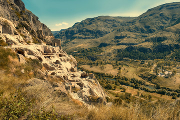 Underground city Vardzia in the rocks in Georgia near Akhaltsikhe autumn Sunny day
