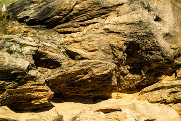 cobblestone on a mountain fenced by a wooden fence, selective focus